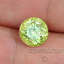 neon yellow green round chrysoberyl